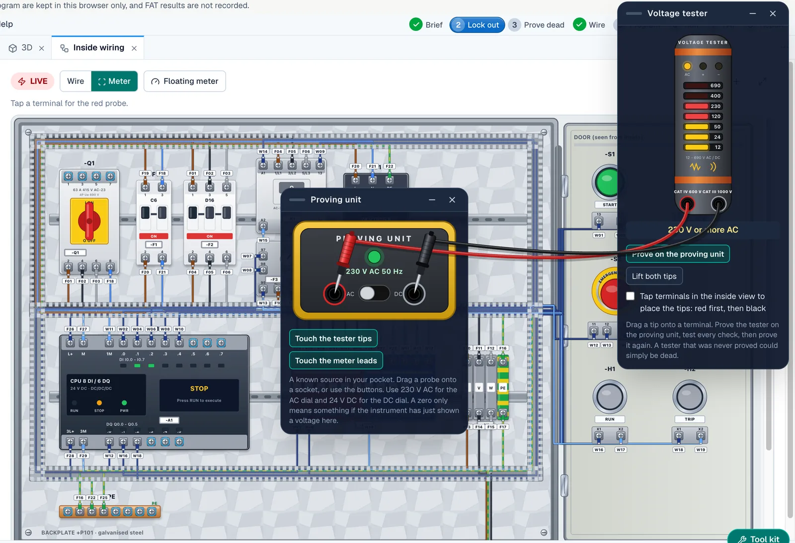 Proving unit window with the voltage tester tips touched on it, so the tester shows 230 V AC before a dead test